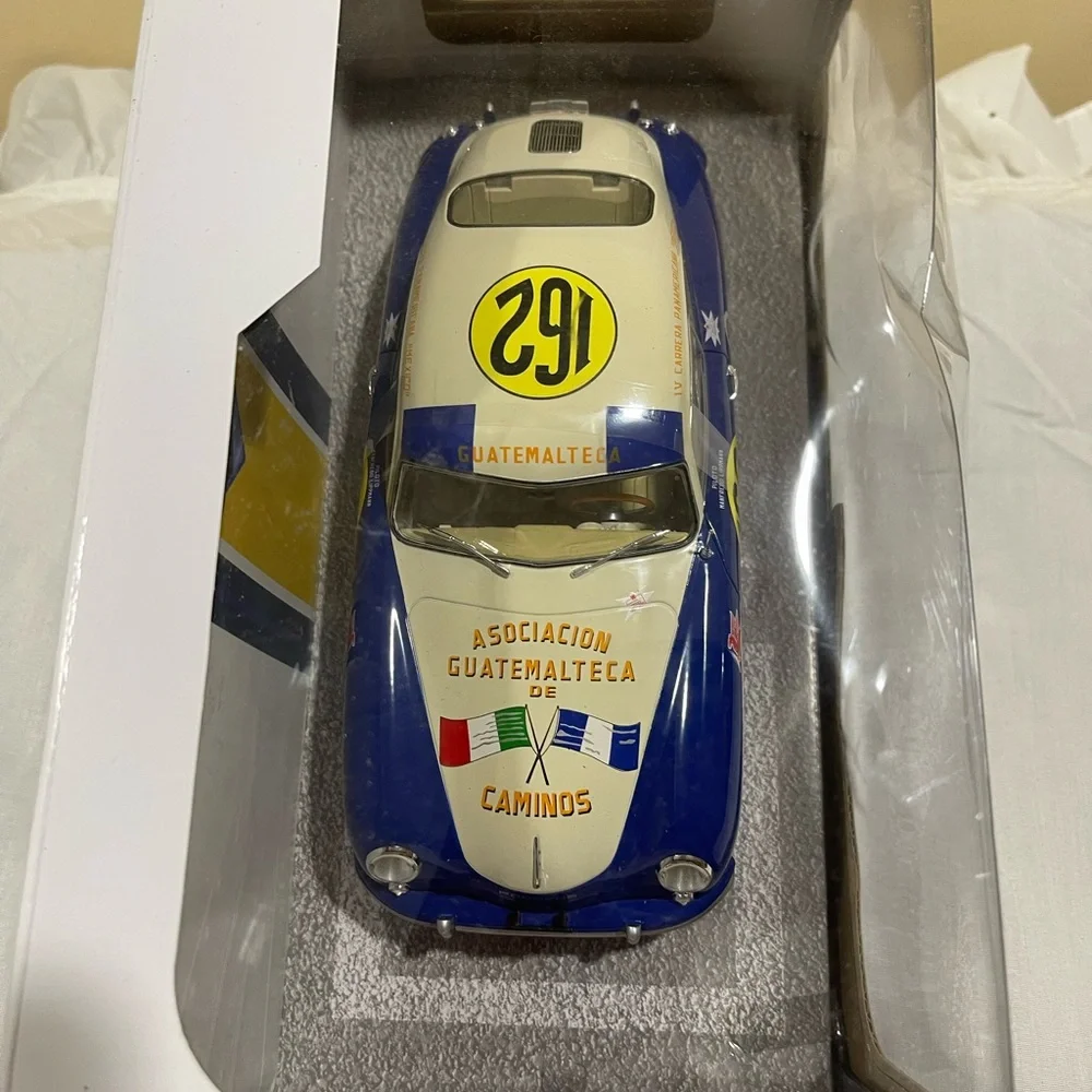 Solid Blue and White Toy Race Car collectible